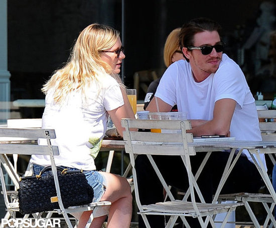 Kirsten Dunst propped her Dolce & Gabbana bag on her chair as she brunched with Garrett Hedlund. Kirsten Dunst propped her Dolce & Gabbana bag on her chair as she brunched with Garrett Hedlund.