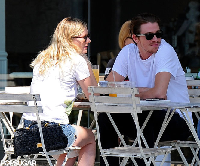Kirsten Dunst propped her Dolce & Gabbana bag on her chair as she brunched with Garrett Hedlund. Kirsten Dunst propped her Dolce & Gabbana bag on her chair as she brunched with Garrett Hedlund.