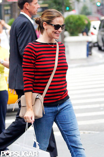 Jennifer Garner carried a messenger bag over her shoulder.
Jennifer Garner carried a messenger bag over her shoulder.