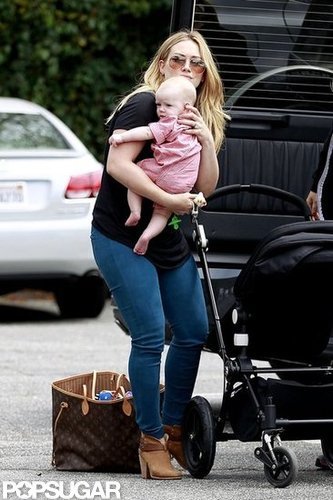 Hilary Duff rocked short brown boots in Santa Monica.
Hilary Duff rocked short brown boots in Santa Monica.