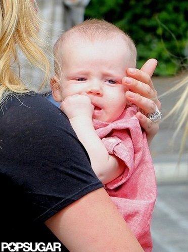 Luca Comrie put his thumb in his mouth as he got a lift from his mom.
Luca Comrie put his thumb in his mouth as he got a lift from his mom.