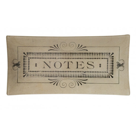Made with decoupaged glass, this Notes Pencil Tray ($92) has a polished, vintage vibe.
Made with decoupaged glass, this Notes Pencil Tray ($92) has a polished, vintage vibe.