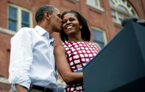 Barack kissed Michelle on the cheek during an Iowa campaign event.
Barack kissed Michelle on the cheek during an Iowa campaign event.