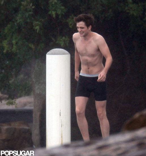 Robert Pattinson took off his shirt to jump in the water in Rio de Janeiro in December 2010.
Robert Pattinson took off his shirt to jump in the water in Rio de Janeiro in December 2010.