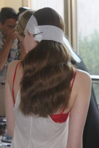 "This is a beautiful high society girl," explained John Frieda Global Creative Consultant Luigi Murenu. "It's very romantic, very chic — Grace Kelly 2013." The elegant waves were created by wrapping hair around a barrel curling iron and brushing out the curls.
"This is a beautiful high society girl," explained John Frieda Global Creative Consultant Luigi Murenu. "It's very romantic, very chic — Grace Kelly 2013." The elegant waves were created by wrapping hair around a barrel curling iron and brushing out the curls.