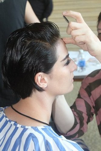 Kabuki created theatrical eye makeup with false lashes and filled-in brows. "This look is timeless because it translates to every woman," Kabuki said. "It's never retro."
Kabuki created theatrical eye makeup with false lashes and filled-in brows. "This look is timeless because it translates to every woman," Kabuki said. "It's never retro."