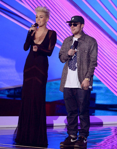 Miley Cyrus and Mac Miller were on stage together.
Miley Cyrus and Mac Miller were on stage together.