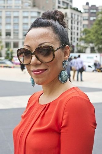 This girl used her tight, curly bun to show off her gorgeous turquoise earrings — a smart move.
Photo by Caroline Voagen Nelson
This girl used her tight, curly bun to show off her gorgeous turquoise earrings — a smart move.
Photo by Caroline Voagen Nelson