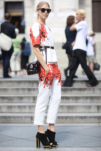 Bold print acts like a frame on this white top and trouser set — the whole look also gets a lift via platform open-toe booties.
Source: Greg Kessler
Bold print acts like a frame on this white top and trouser set — the whole look also gets a lift via platform open-toe booties.
Source: Greg Kessler