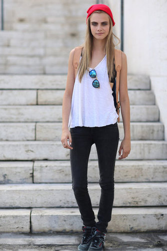 Cara Delevingne showed off her grungy-cool side with lace-up boots and mirrored shades.
Source: Greg Kessler
Cara Delevingne showed off her grungy-cool side with lace-up boots and mirrored shades.
Source: Greg Kessler
