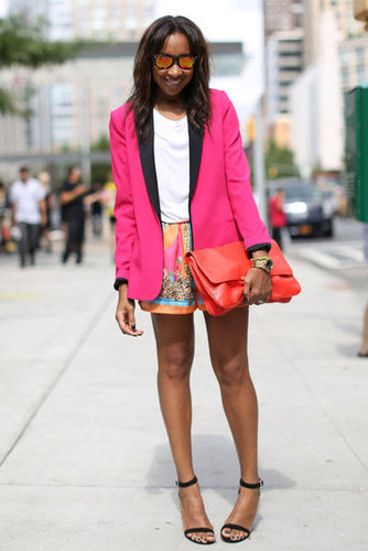 A megawatt blazer and mirrored shades.
A megawatt blazer and mirrored shades.