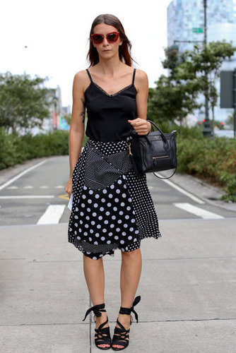Polka dots got a modern touch in an asymmetrical cut, finished with a Céline minitote and statement shades.
Polka dots got a modern touch in an asymmetrical cut, finished with a Céline minitote and statement shades.