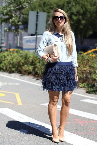 A feathered skirt played a very glamorous opposite to a chambray button-down.
A feathered skirt played a very glamorous opposite to a chambray button-down.