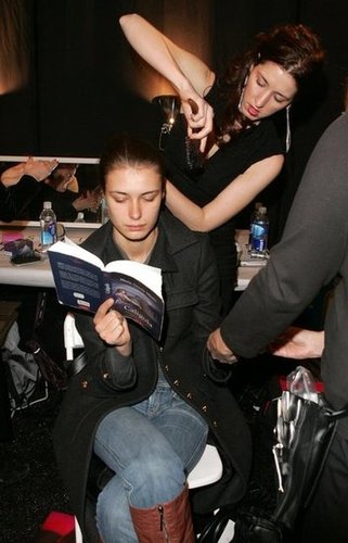 Caligula by Maria Grazia Siliato and Teresa Clavel Lledo was this model's book pick backstage at the Atil Kutoglu Fall 2007 fashion show during Mercedes-Benz Fashion Week.
Caligula by Maria Grazia Siliato and Teresa Clavel Lledo was this model's book pick backstage at the Atil Kutoglu Fall 2007 fashion show during Mercedes-Benz Fashion Week.