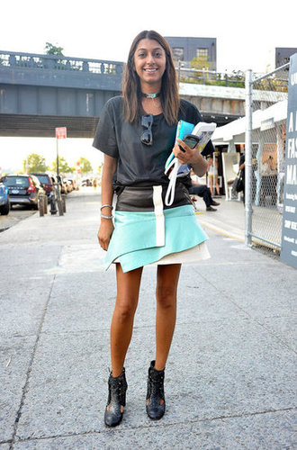This styler, um, wrapped up her look with a bold, architectural skirt and glittered booties.
This styler, um, wrapped up her look with a bold, architectural skirt and glittered booties.