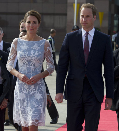 We can't get over how sweet and feminine the floral appliqué details of her Temperley London dress are — and Prince William looks quite dapper, too.
We can't get over how sweet and feminine the floral appliqué details of her Temperley London dress are — and Prince William looks quite dapper, too.