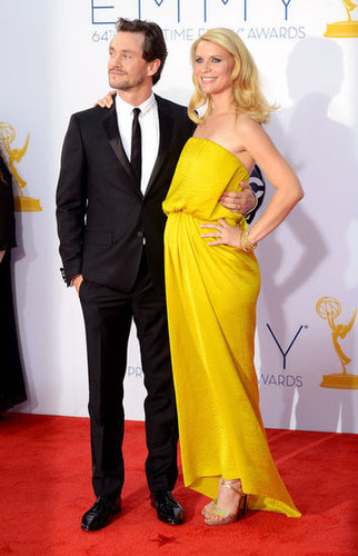 A pregnant Claire Danes walked the red carpet with husband Hugh Dancy at the Emmys.
A pregnant Claire Danes walked the red carpet with husband Hugh Dancy at the Emmys.