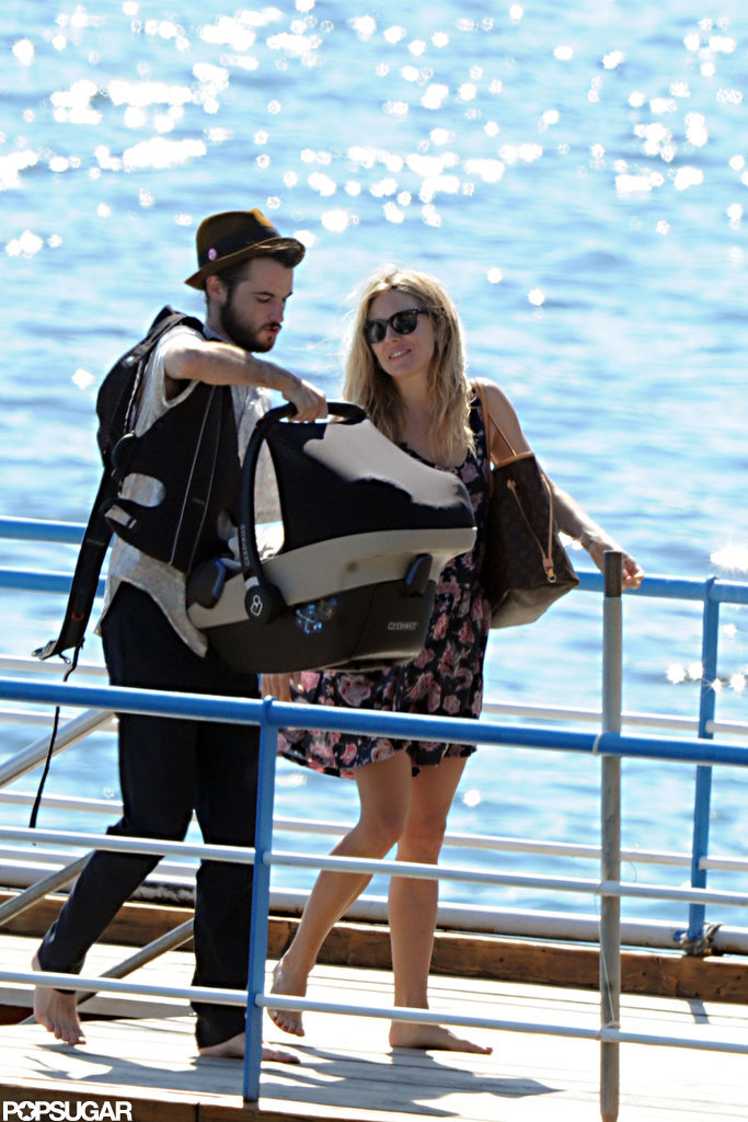 Tom Sturridge carried Marlowe in a carrier off of a boat in Positano with Sienna Miller.
Tom Sturridge carried Marlowe in a carrier off of a boat in Positano with Sienna Miller.