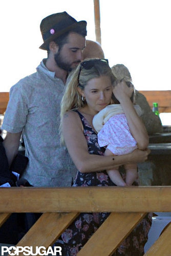 Sienna Miller held baby Marlowe tight with Tom Sturridge close by on their boat ride.
Sienna Miller held baby Marlowe tight with Tom Sturridge close by on their boat ride.