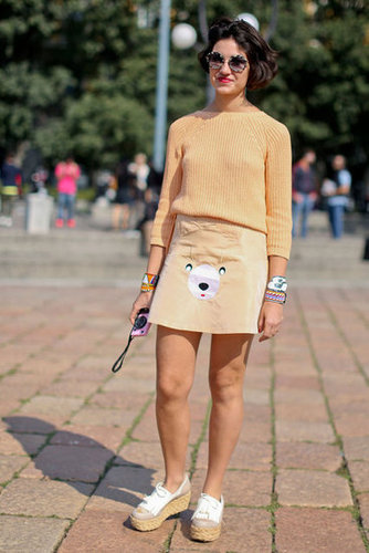 A cheeky skirt and neutral knit played opposites in this look.
A cheeky skirt and neutral knit played opposites in this look.