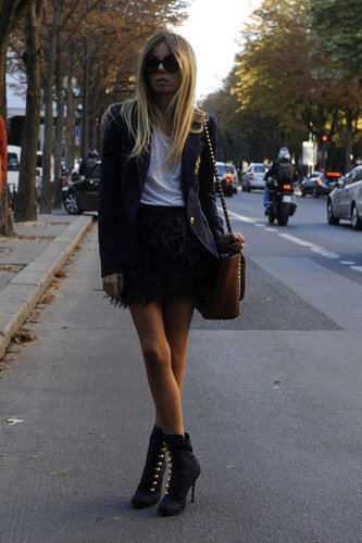 A feathered skirt was a glamorous counter to a preppy blazer.
A feathered skirt was a glamorous counter to a preppy blazer.