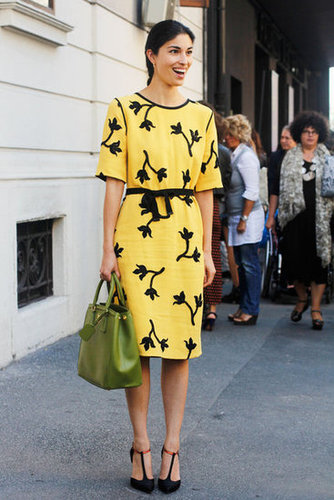 Caroline Issa is a vision in yellow Roland Mouret,and we can't help but admire her olive green bag and T-strap pumps too.
Caroline Issa is a vision in yellow Roland Mouret,and we can't help but admire her olive green bag and T-strap pumps too.