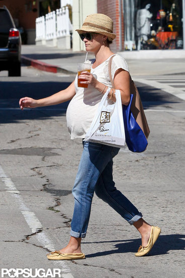 Reese Witherspoon showed off her baby bump during a shopping trip in LA. Reese Witherspoon showed off her baby bump during a shopping trip in LA.