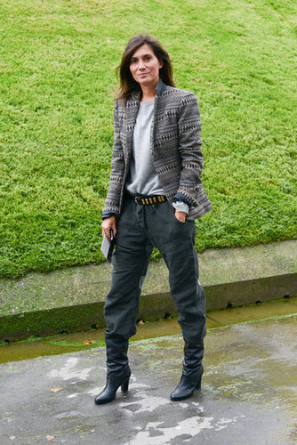 Emmanuelle Alt reworked a variation on her "uniform" in a pair of gray trousers and a printed blazer.
Emmanuelle Alt reworked a variation on her "uniform" in a pair of gray trousers and a printed blazer.