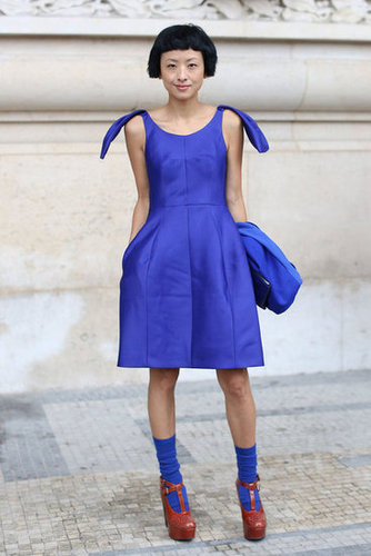 Such a pretty shade of blue, why wouldn't you want your socks to match? Her cheeky socks complement the vibrant hue of her dress and lend a charming, unique touch.
Such a pretty shade of blue, why wouldn't you want your socks to match? Her cheeky socks complement the vibrant hue of her dress and lend a charming, unique touch.