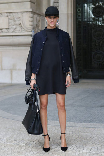 The varsity jacket and a cap gave this LBD look sporty appeal.
The varsity jacket and a cap gave this LBD look sporty appeal.