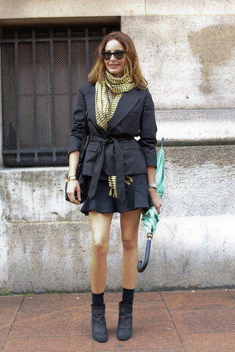 We love the way a belted blazer and booties anchor her fluted skirt.
We love the way a belted blazer and booties anchor her fluted skirt.