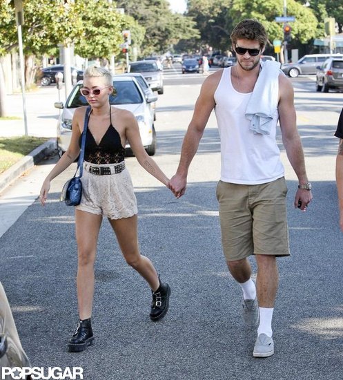 Liam Hemsworth and Miley Cyrus held hands in LA. Liam Hemsworth and Miley Cyrus held hands in LA.