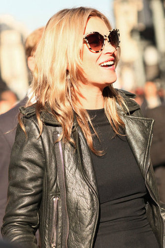 Kate Moss kept cool in a leather jacket and cat-eye shades.
Kate Moss kept cool in a leather jacket and cat-eye shades.