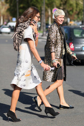 Staying warm at PFW is about staying stylish, too — a chunky scarf thrown over a printed sheath does the job; so does a sparkling topper.
Staying warm at PFW is about staying stylish, too — a chunky scarf thrown over a printed sheath does the job; so does a sparkling topper.