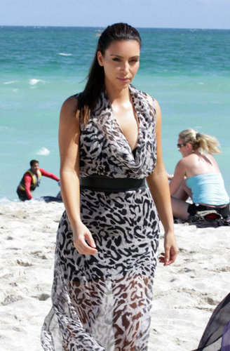 Kim and Kourtney Hit the Beach While Khloe Preps For The X Factor Kim and Kourtney Hit the Beach While Khloe Preps For The X Factor