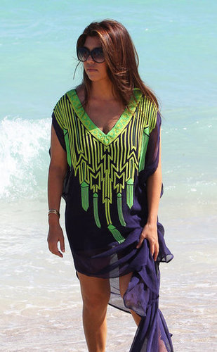 Kim and Kourtney Hit the Beach While Khloe Preps For The X Factor Kim and Kourtney Hit the Beach While Khloe Preps For The X Factor