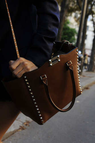 Studs took this brown leather tote to an edgier place.
Studs took this brown leather tote to an edgier place.