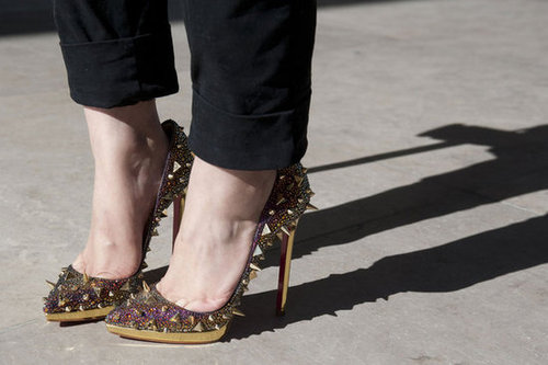 Spiked and glitzy heels were the epitome of statement accessories.
Spiked and glitzy heels were the epitome of statement accessories.