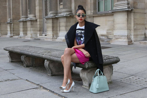 This styler played off a few trends at once, embracing cap-toe heels and a t-shirt right along with her bright mini.
This styler played off a few trends at once, embracing cap-toe heels and a t-shirt right along with her bright mini.