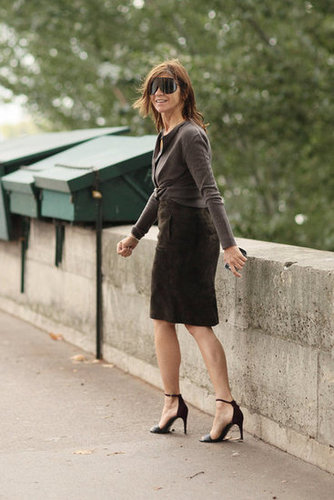 Carine Roitfeld gave a sly smile as she made her out of the shows in her signature mix of slim skirt and heels.
Carine Roitfeld gave a sly smile as she made her out of the shows in her signature mix of slim skirt and heels.
