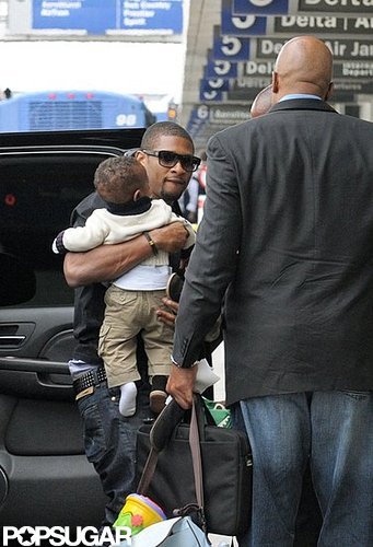 Before taking off at LAX in 2008, Usher gave little Usher V a squeeze.
Before taking off at LAX in 2008, Usher gave little Usher V a squeeze.