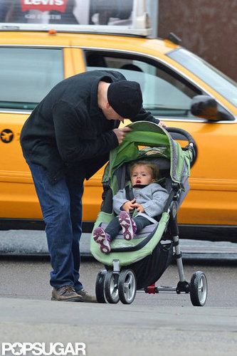 Matt Damon checked on Stella Damon in her stroller during their walk.
Matt Damon checked on Stella Damon in her stroller during their walk.
