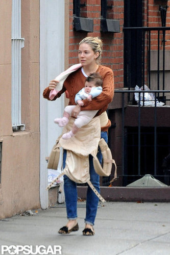 Sienna Miller held Marlowe in her arms.
Sienna Miller held Marlowe in her arms.