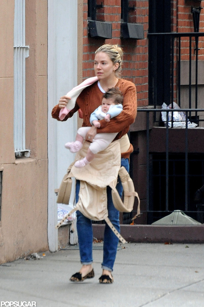 Sienna Miller held Marlowe in her arms. Sienna Miller held Marlowe in her arms.