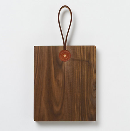 Mimic the beautiful woodgrain countertops in this kitchen by picking up a Workshop Walnut Serving Board ($168). It can even be displayed on the wall when not in use.
Mimic the beautiful woodgrain countertops in this kitchen by picking up a Workshop Walnut Serving Board ($168). It can even be displayed on the wall when not in use.