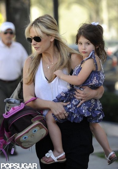 Sarah Michelle Gellar carried Charlotte Prinze along with her backpack.
Sarah Michelle Gellar carried Charlotte Prinze along with her backpack.