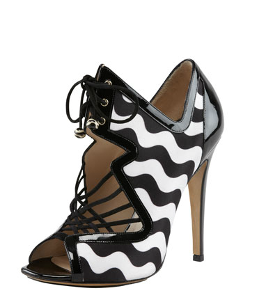 Inject a playful note into your lace-up agenda via this Nicholas Kirkwood sandal ($1,090). It's a bold (and colorblocked) testament to the designer's quirky charm and your penchant for whimsical prints.
Inject a playful note into your lace-up agenda via this Nicholas Kirkwood sandal ($1,090). It's a bold (and colorblocked) testament to the designer's quirky charm and your penchant for whimsical prints.