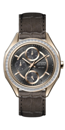 This stainless steel and rose-gold tone case and gray leather strap with Eco-Drive technology never needs a battery. It also features luminous hands, Swarovski Crystal Bezel, and a "D"-engraved crown. Click here to purchase.
This stainless steel and rose-gold tone case and gray leather strap with Eco-Drive technology never needs a battery. It also features luminous hands, Swarovski Crystal Bezel, and a "D"-engraved crown. Click here to purchase.