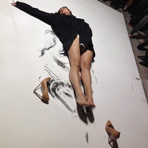 Models showcased the Maison Martin Margiela and H&M collection with performance art. We couldn't take our eyes off those clear wedges!
Models showcased the Maison Martin Margiela and H&M collection with performance art. We couldn't take our eyes off those clear wedges!