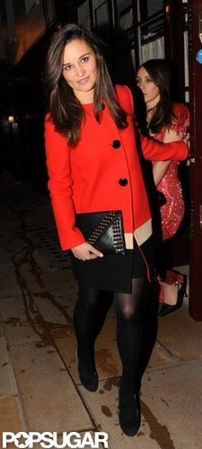 Pippa Middleton carried an oversize clutch.
Pippa Middleton carried an oversize clutch.